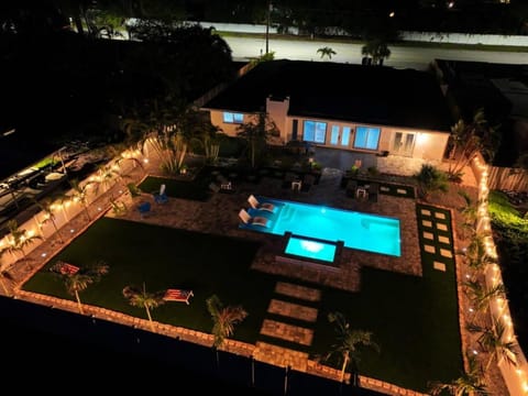 Property building, Patio, Night, Bird's eye view, Pool view, Swimming pool, sunbed
