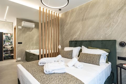 Bed, Bedroom, towels, air conditioner