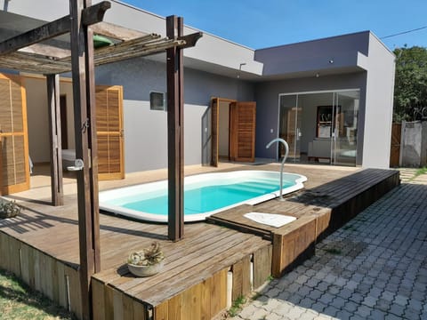 Property building, Patio, Day, Pool view, Swimming pool