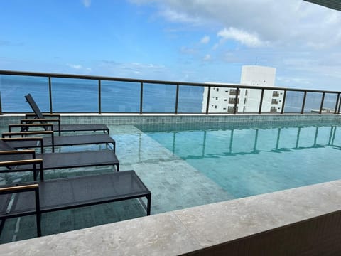 View (from property/room), Balcony/Terrace, Pool view, Sea view, Swimming pool, sunbed