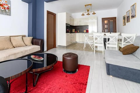 Kitchen or kitchenette, Living room, Seating area, Dining area