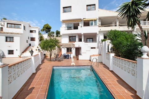 Property building, Living room, Swimming pool