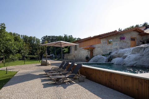 Property building, Swimming pool, sunbed