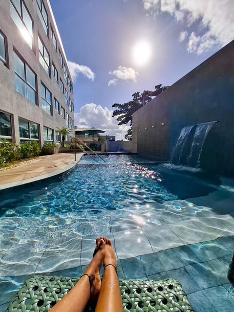 Property building, Day, Pool view, Swimming pool, sunbed