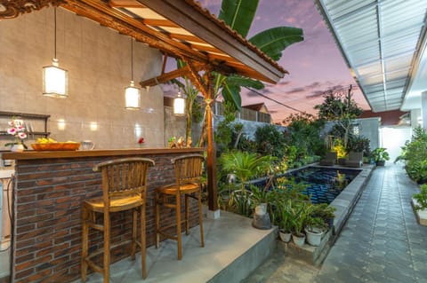 Property building, Garden, Seating area, Swimming pool