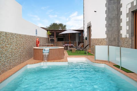 Property building, Living room, Swimming pool