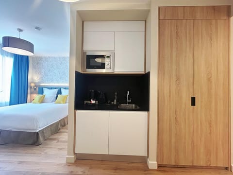 Bed, Kitchen or kitchenette, wardrobe