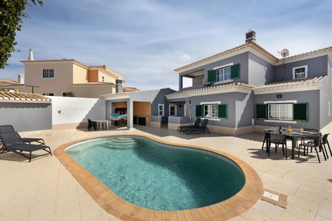 Property building, Living room, Swimming pool