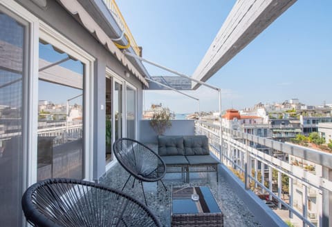 Property building, Day, View (from property/room), Balcony/Terrace, Seating area