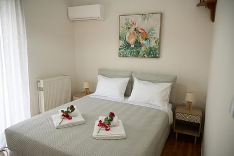 Bed, Photo of the whole room, Bedroom, towels, air conditioner