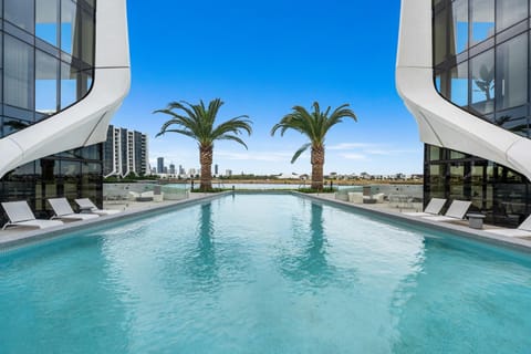 Property building, Swimming pool, Swimming pool, sunbed