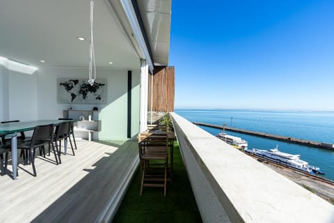 Natural landscape, View (from property/room), Balcony/Terrace, Living room, Seating area, Dining area, Sea view
