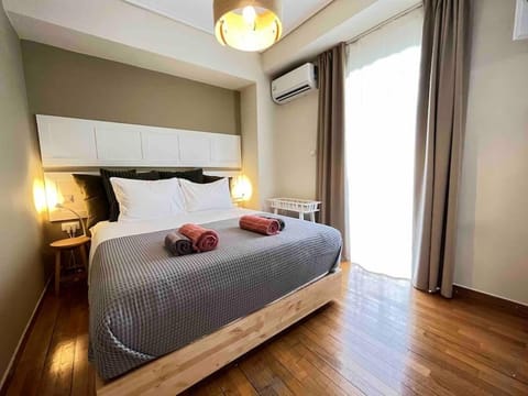 Bed, Photo of the whole room, Bedroom, towels, air conditioner