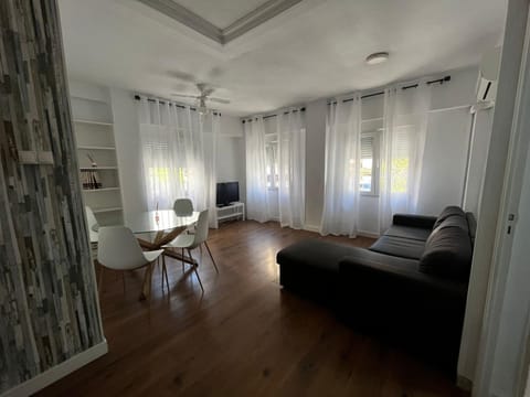 TV and multimedia, Living room, Seating area, fireplace, air conditioner