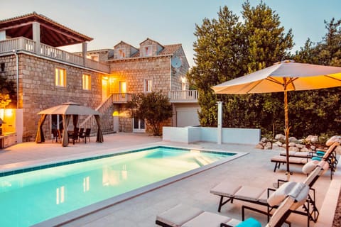 Property building, Patio, Day, Pool view, Swimming pool