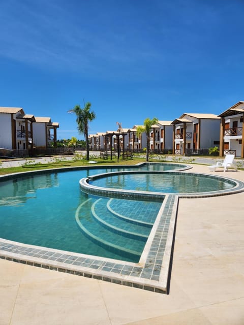 Property building, Day, Pool view, Swimming pool, sunbed
