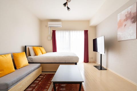 Bed, TV and multimedia, Living room, Photo of the whole room, Seating area, Bedroom, furniture, air conditioner