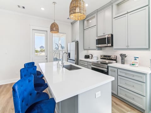Kitchen or kitchenette, Seating area, furniture, microwave, oven, stove