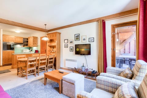 Bed, fireplace, kitchen