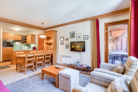 Bed, fireplace, kitchen
