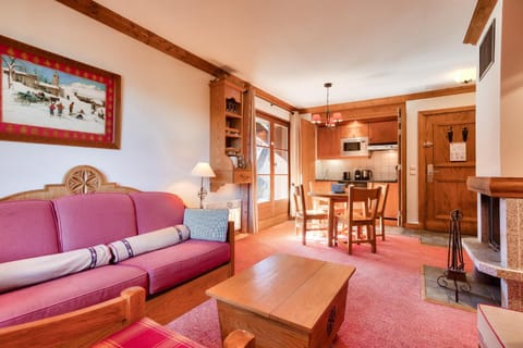 Bed, Living room, fireplace, kitchen