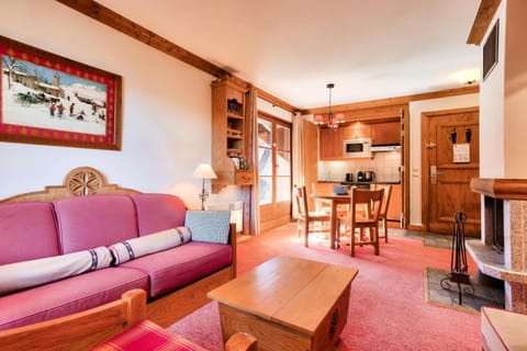 Bed, Living room, fireplace, kitchen