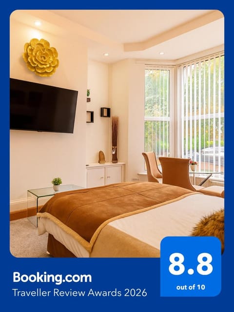 Communal lounge/ TV room, Bed, Property logo or sign, TV and multimedia, Photo of the whole room, Evening entertainment, Logo/Certificate/Sign, Certificate/Award