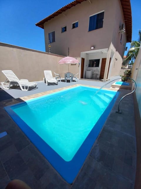 Property building, Patio, Day, Pool view, Swimming pool, sunbed