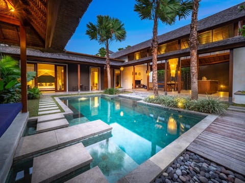 Property building, Patio, Pool view, Swimming pool, sunbed