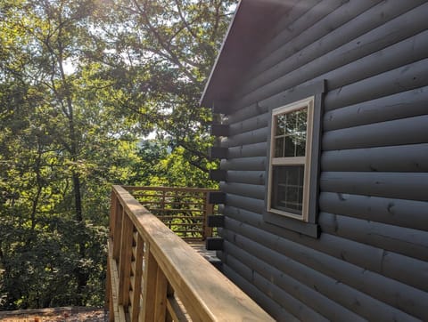Cabin #6 with hot tub deck and sunset view at Loblolly Pines Cabin in Eureka Springs