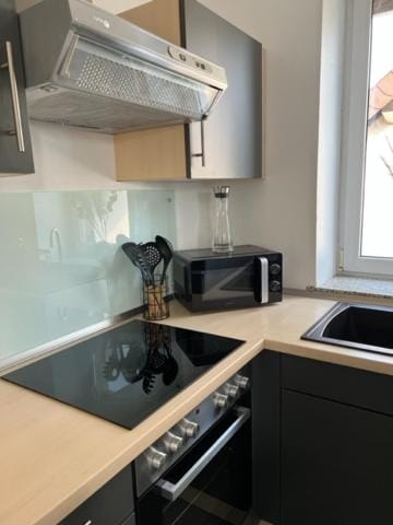 Kitchen or kitchenette, stove