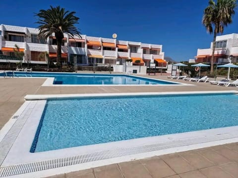 Property building, Pool view, Swimming pool, sunbed