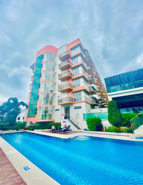 Property building, Pool view, Swimming pool, sunbed