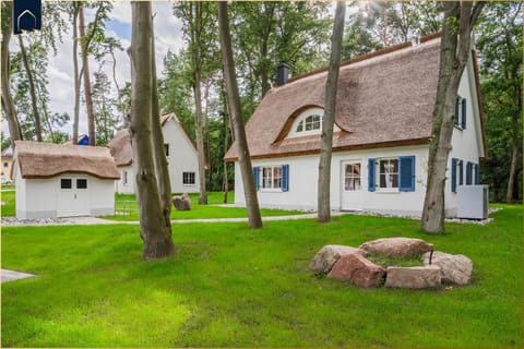 Fischerdorf Ferienhaus Im Kiefernwäldchen House in Zirchow