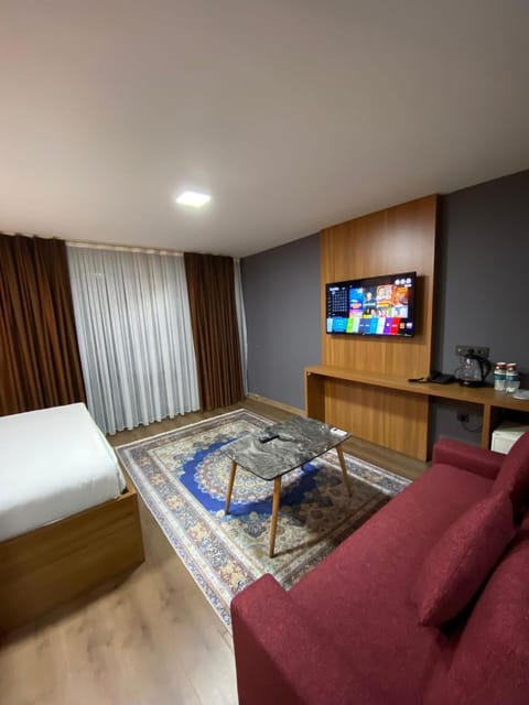 Bed, Living room, Seating area