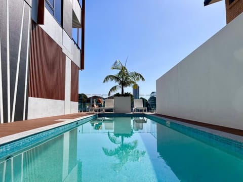 Swimming pool, sunbed