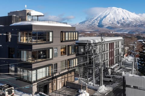 Property building, Nearby landmark, Day, Natural landscape, City view, Mountain view