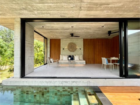 Living room, Seating area, Garden view, Swimming pool