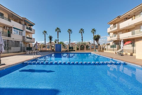 Property building, Living room, Swimming pool