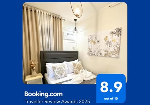 Bed, Photo of the whole room, Bedroom, Text overlay, air conditioner