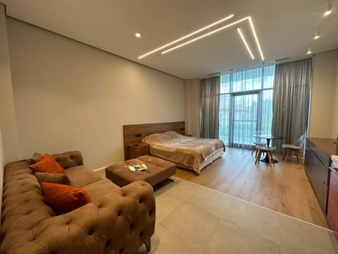 Bed, TV and multimedia, Living room, Photo of the whole room, Seating area, Bedroom