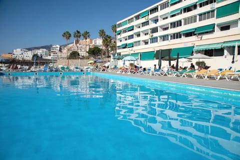 Property building, Pool view, Swimming pool, sunbed
