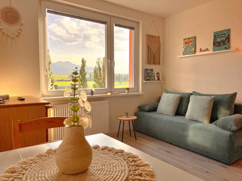 View (from property/room), Living room, Seating area, Mountain view, River view