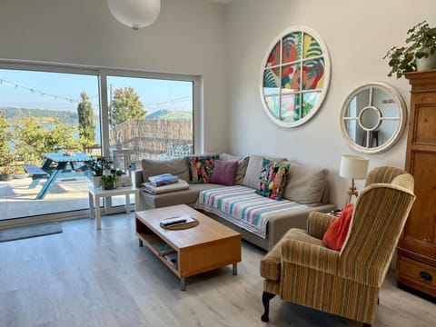 View (from property/room), Balcony/Terrace, Living room, Seating area, Garden view
