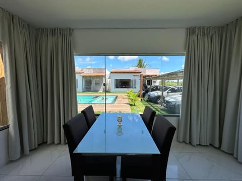 Living room, Dining area, Pool view