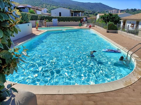 Property building, Living room, Swimming pool