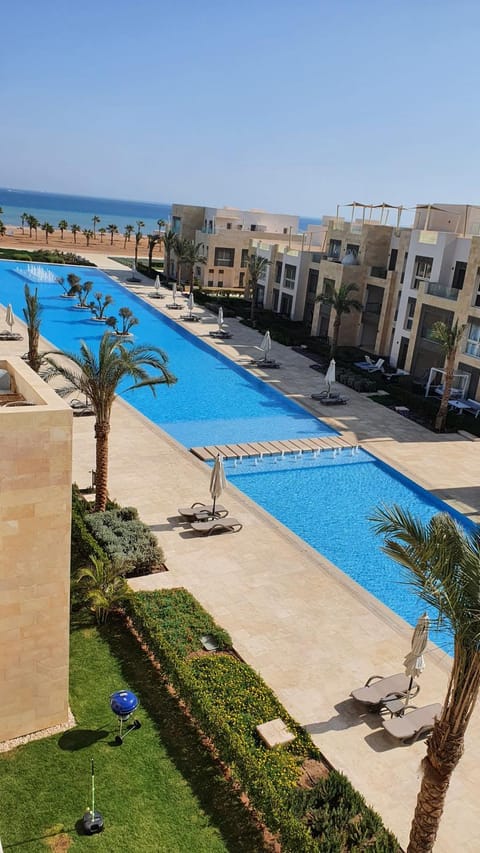 Property building, Natural landscape, Beach, Pool view, Sea view, Swimming pool, sunbed