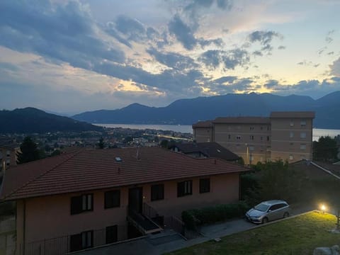 Property building, Natural landscape, Lake view, Mountain view, Sunset