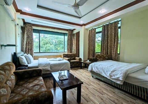 Bed, Seating area, Bedroom, Garden view