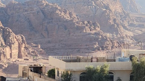 Property building, Nearby landmark, Day, Natural landscape, Mountain view